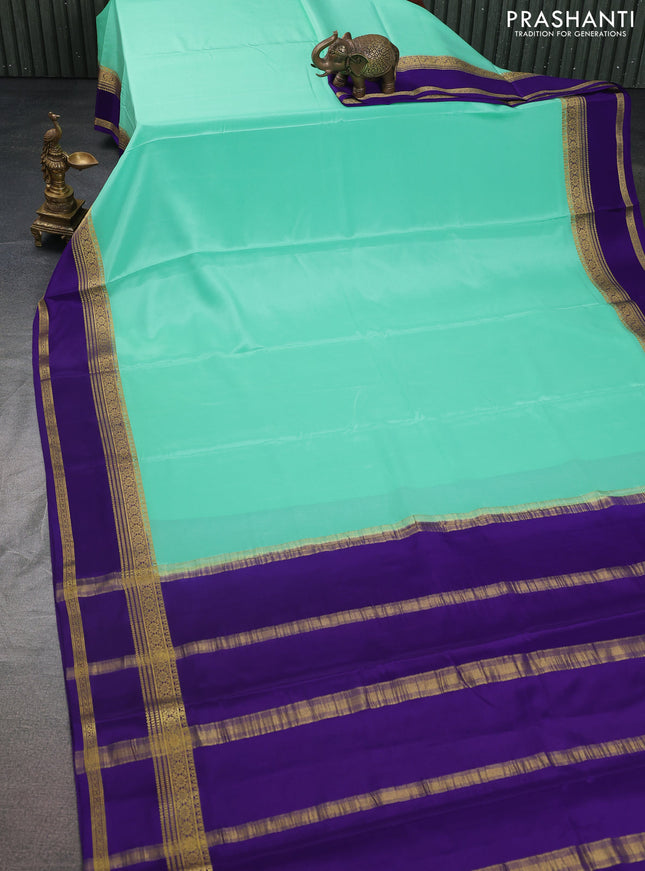 Pure mysore silk saree teal green and violet with plain body and rettapet zari woven border