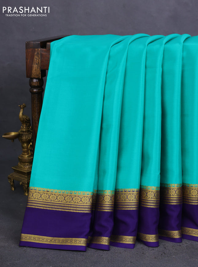 Pure mysore silk saree teal green and dark blue with plain body and rettapet zari woven border