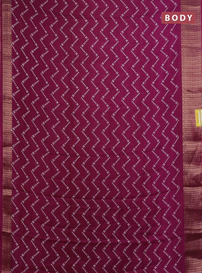 Semi dola saree wine shade with allover zig zag prints and zari woven border