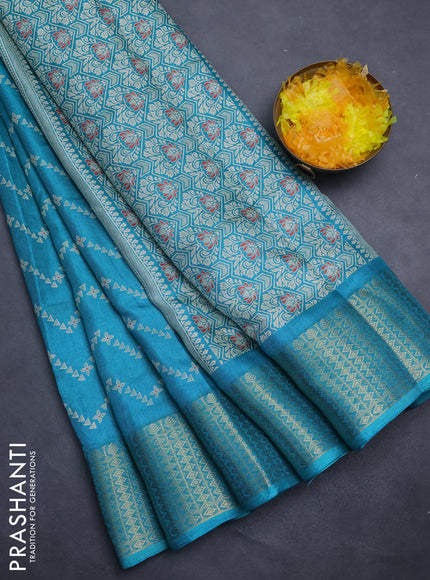 Semi dola saree teal blue with allover zig zag prints and zari woven border