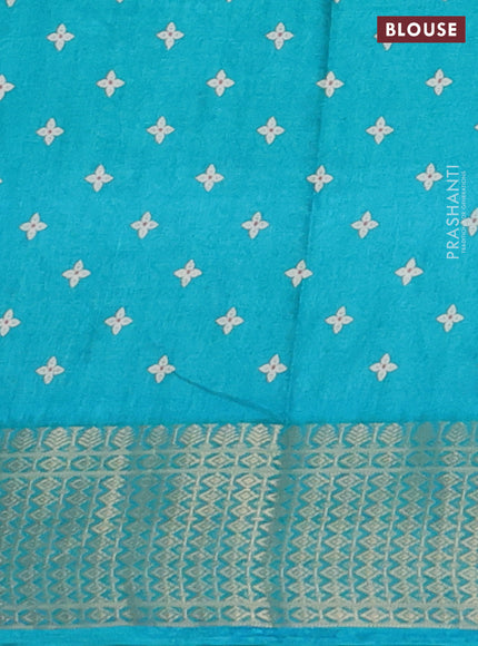 Semi dola saree teal blue with allover zig zag prints and zari woven border