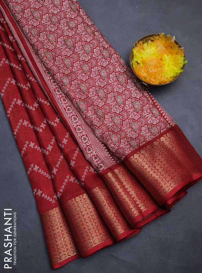 Semi dola saree maroon with allover zig zag prints and zari woven border