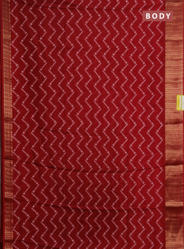 Semi dola saree maroon with allover zig zag prints and zari woven border