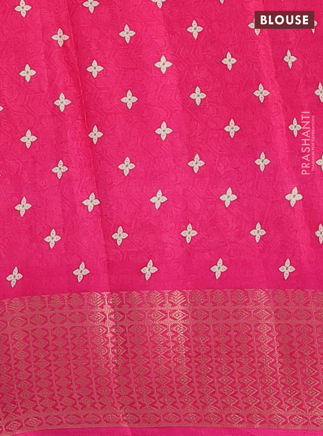 Semi dola saree pink with allover zig zag prints and zari woven border