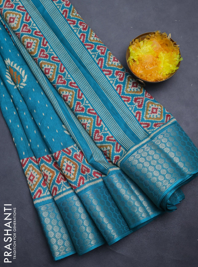 Semi dola saree teal blue with allover prints and zari woven border