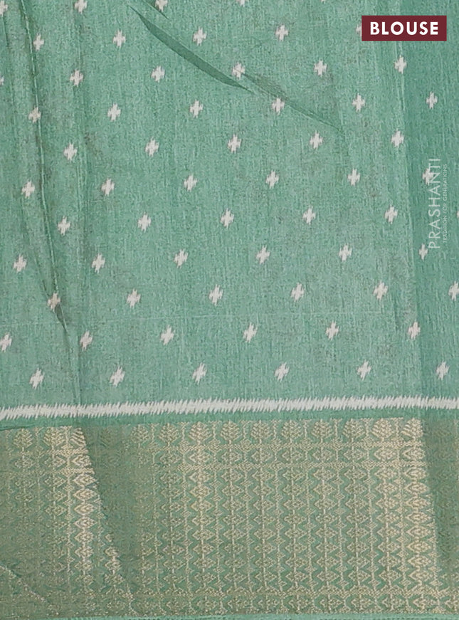 Semi dola saree pastel green with allover prints and zari woven border