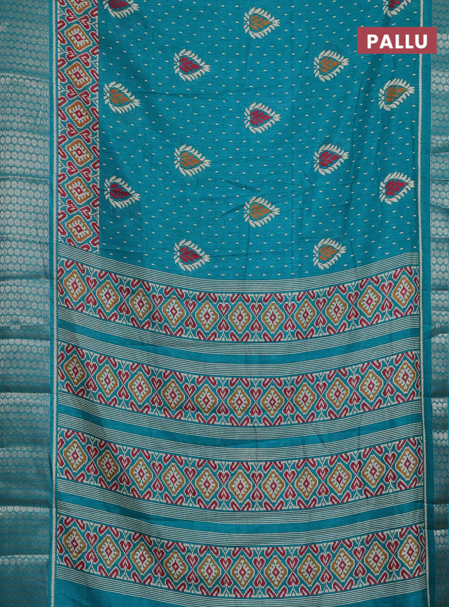 Semi dola saree teal blue with allover prints and zari woven border