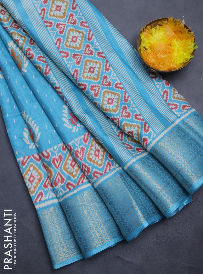 Semi dola saree teal blue with allover prints and zari woven border