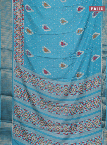 Semi dola saree teal blue with allover prints and zari woven border