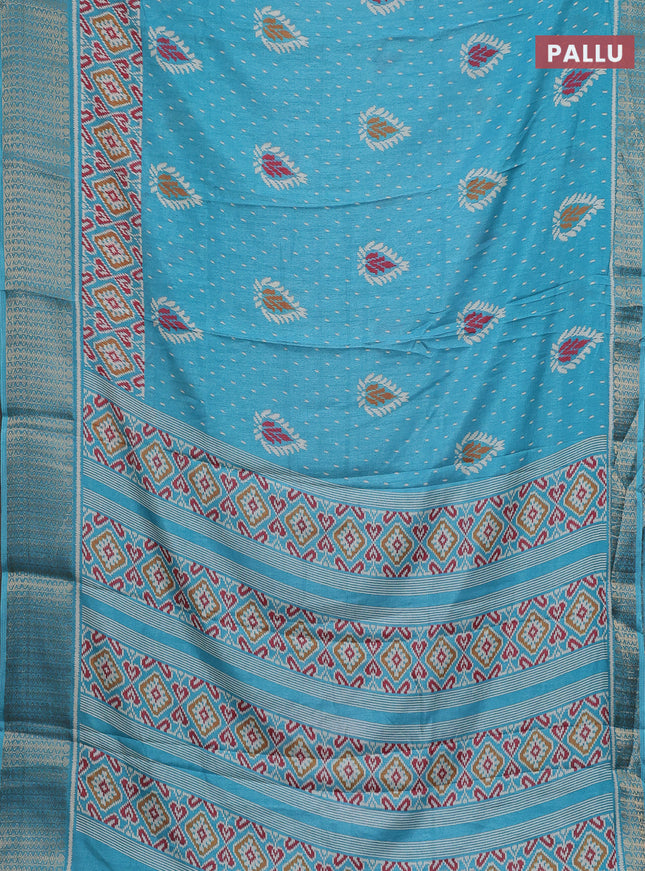 Semi dola saree teal blue with allover prints and zari woven border
