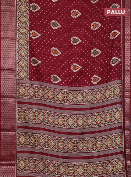 Semi dola saree maroon with allover prints and zari woven border
