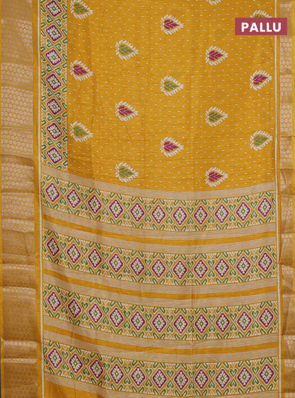 Semi dola saree mustard yellow with allover prints and zari woven border