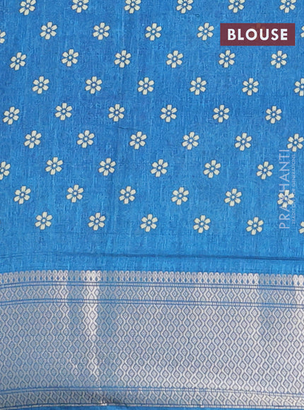 Semi dola saree blue shade with allover prints and zari woven border