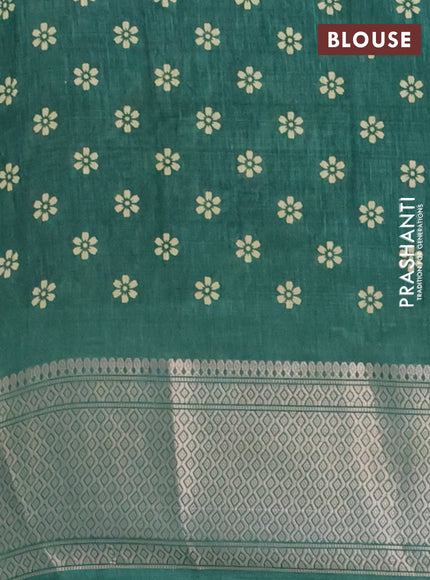 Semi dola saree green with allover prints and zari woven border