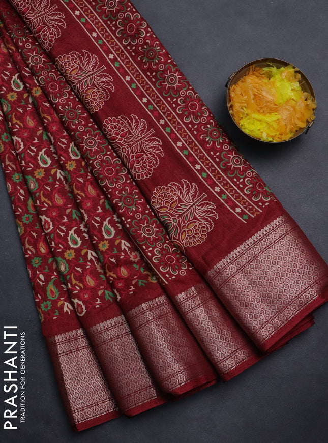 Semi dola saree maroon with allover prints and zari woven border