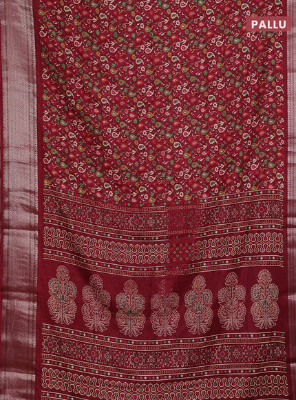 Semi dola saree maroon with allover prints and zari woven border