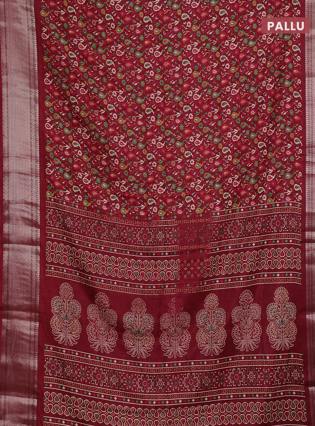 Semi dola saree maroon with allover prints and zari woven border