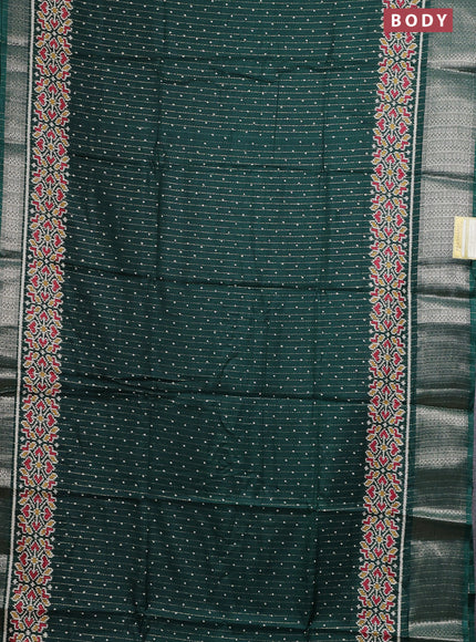 Semi dola saree bottle green with allover ikat butta prints & zari weaves and zari woven border