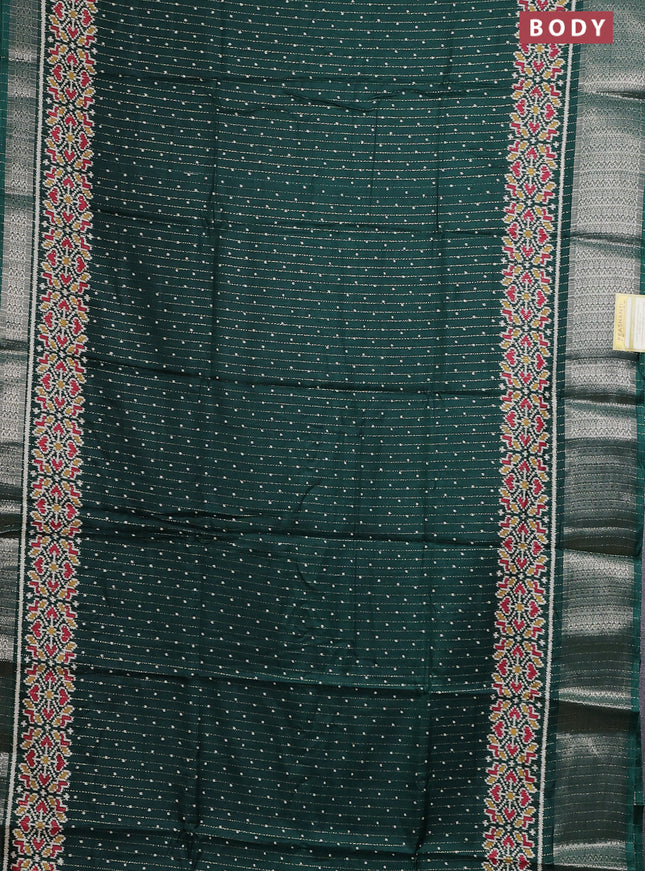 Semi dola saree bottle green with allover ikat butta prints & zari weaves and zari woven border