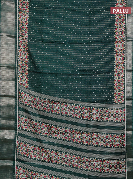 Semi dola saree bottle green with allover ikat butta prints & zari weaves and zari woven border