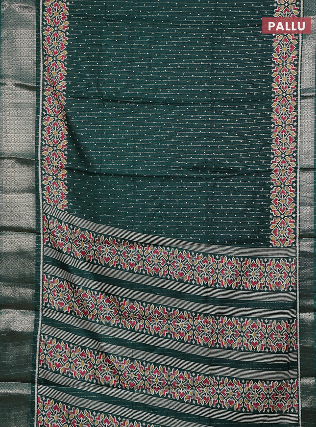 Semi dola saree bottle green with allover ikat butta prints & zari weaves and zari woven border