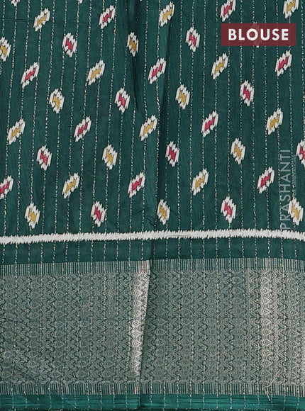 Semi dola saree bottle green with allover ikat butta prints & zari weaves and zari woven border