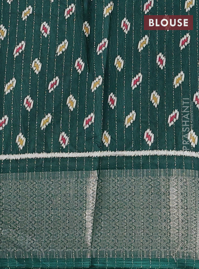 Semi dola saree bottle green with allover ikat butta prints & zari weaves and zari woven border