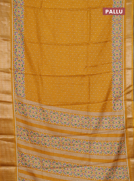 Semi dola saree mustard yellow with allover ikat butta prints & zari weaves and zari woven border
