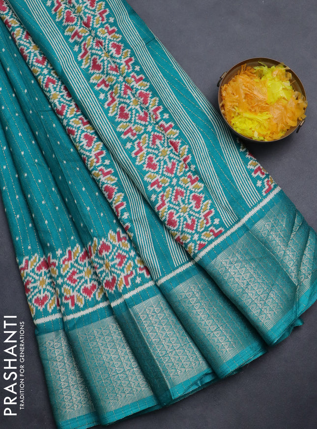 Semi dola saree teal green with allover ikat butta prints & zari weaves and zari woven border