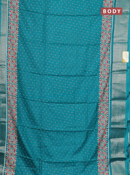 Semi dola saree teal green with allover ikat butta prints & zari weaves and zari woven border