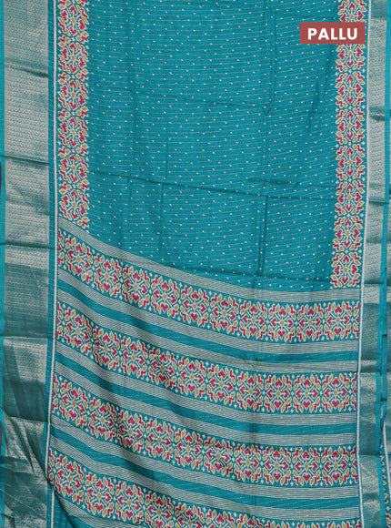 Semi dola saree teal green with allover ikat butta prints & zari weaves and zari woven border