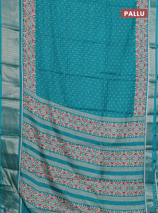 Semi dola saree teal green with allover ikat butta prints & zari weaves and zari woven border