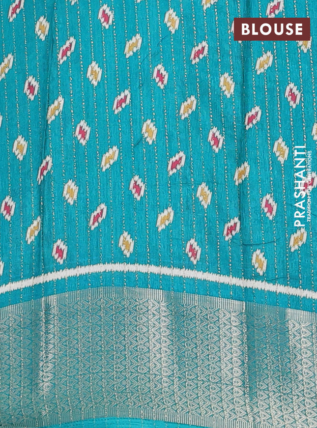 Semi dola saree teal green with allover ikat butta prints & zari weaves and zari woven border