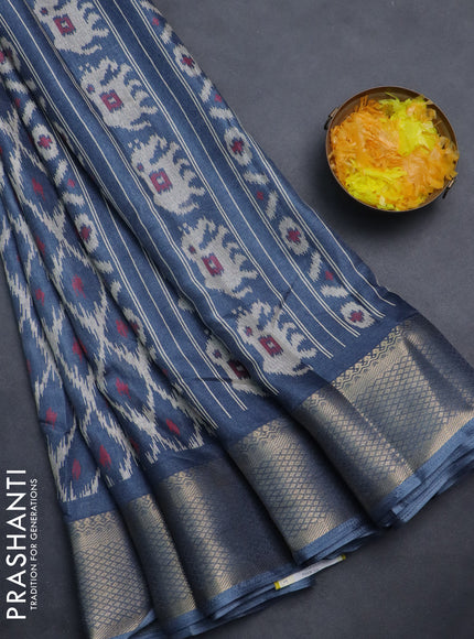 Semi dola saree bluish grey with allover ikat prints and zari woven border