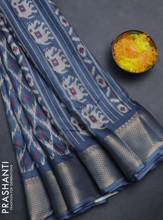 Semi dola saree bluish grey with allover ikat prints and zari woven border
