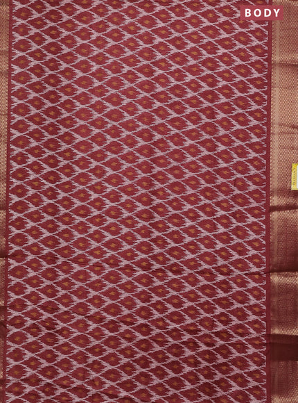 Semi dola saree maroon shade with allover ikat prints and zari woven border