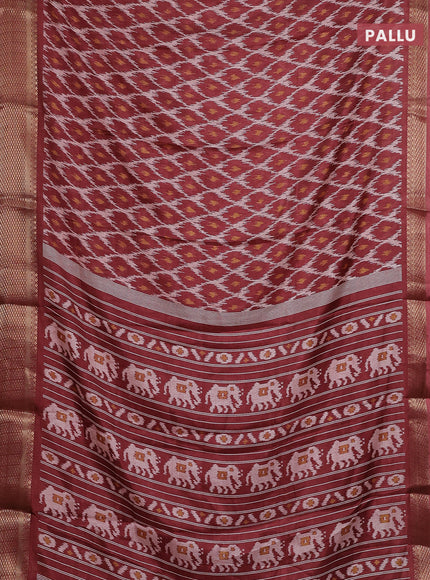 Semi dola saree maroon shade with allover ikat prints and zari woven border