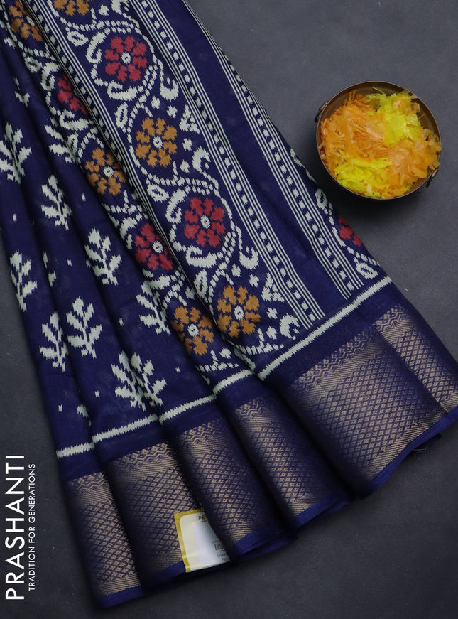 Semi dola saree navy blue with allover ikat butta prints and zari woven border