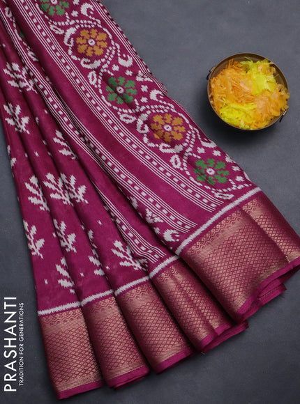 Semi dola saree wine shade with allover ikat butta prints and zari woven border