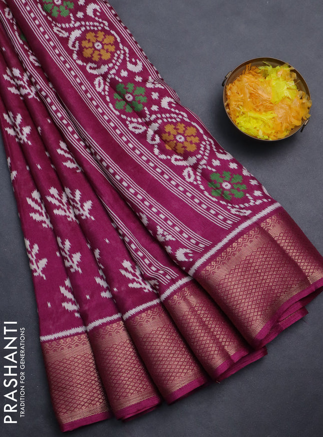 Semi dola saree wine shade with allover ikat butta prints and zari woven border