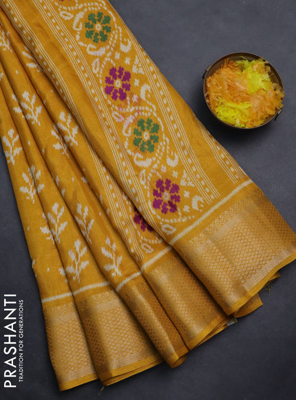 Semi dola saree mustard yellow with allover ikat butta prints and zari woven border