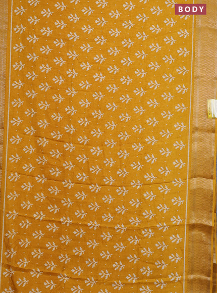 Semi dola saree mustard yellow with allover ikat butta prints and zari woven border