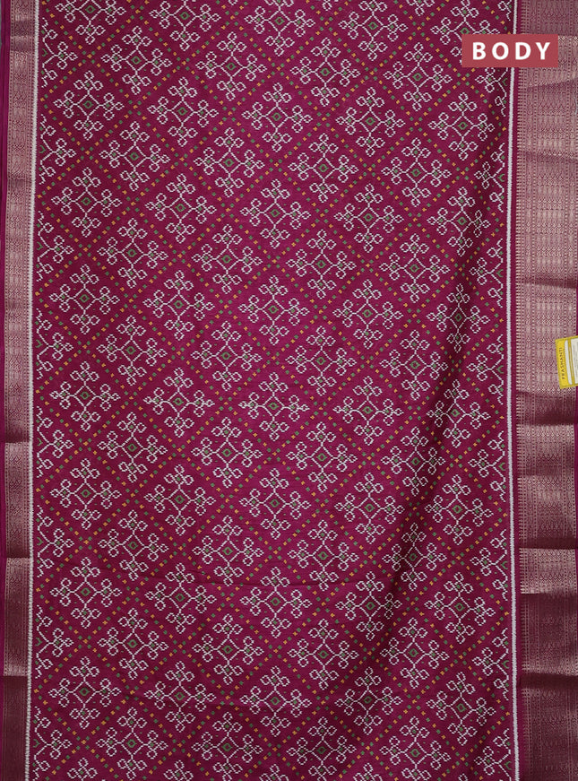 Semi dola saree wine shade with allover ikat prints and zari woven border