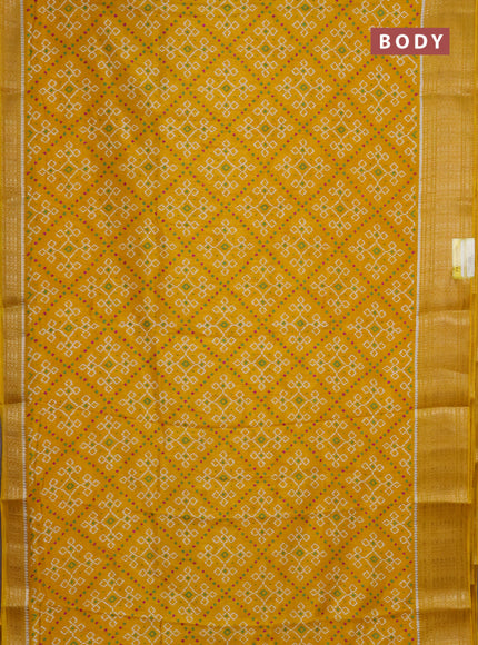 Semi dola saree mustard yellow with allover ikat prints and zari woven border