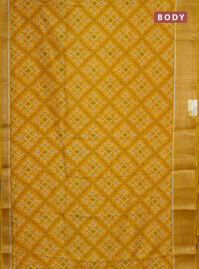 Semi dola saree mustard yellow with allover ikat prints and zari woven border