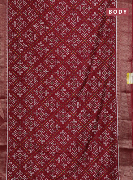 Semi dola saree maroon with allover ikat prints and zari woven border