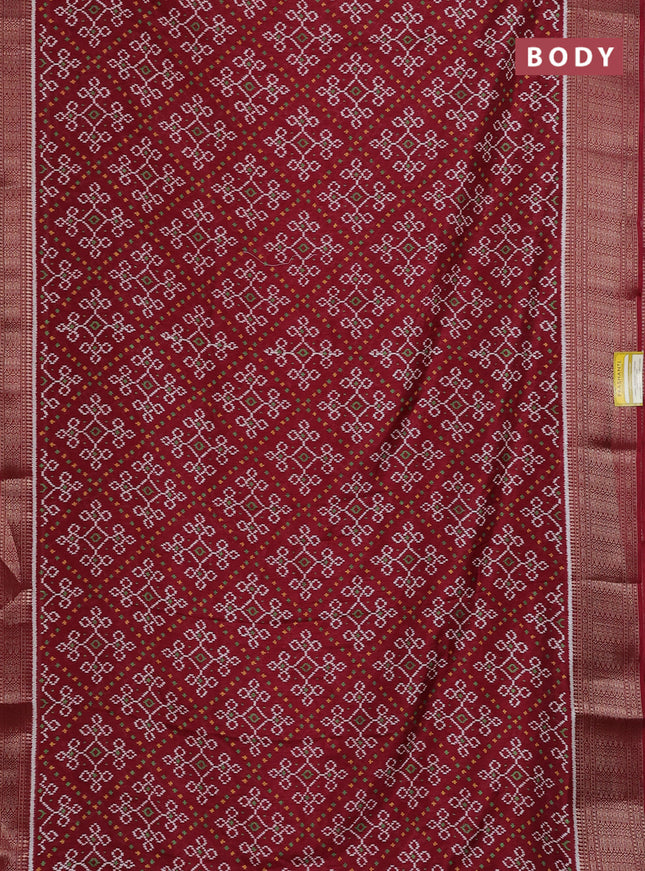 Semi dola saree maroon with allover ikat prints and zari woven border