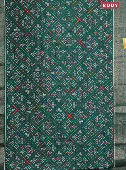 Semi dola saree green with allover ikat prints and zari woven border