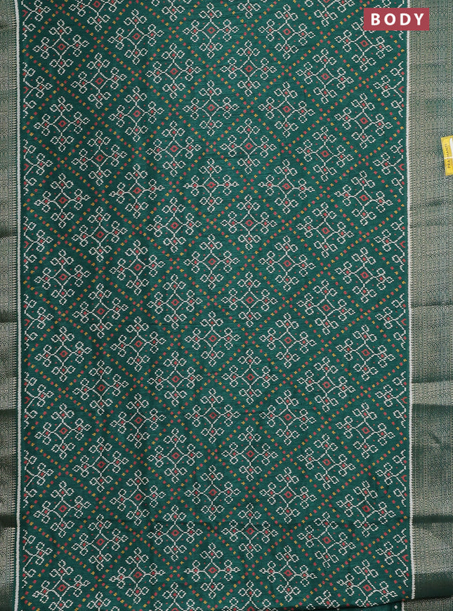 Semi dola saree green with allover ikat prints and zari woven border