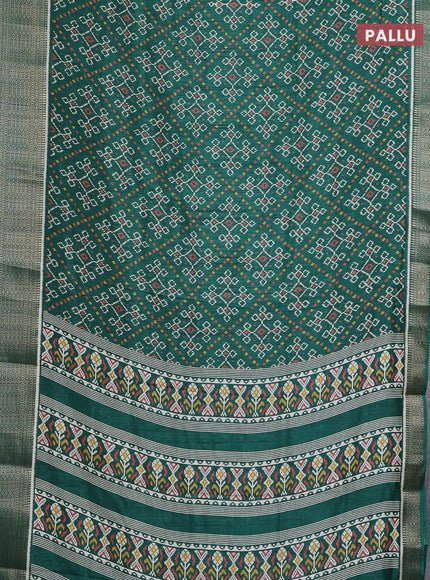 Semi dola saree green with allover ikat prints and zari woven border